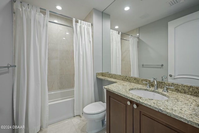 full bathroom featuring shower / tub combo, vanity, and toilet