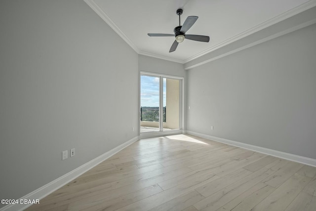 unfurnished room featuring ceiling fan, light hardwood / wood-style floors, and ornamental molding