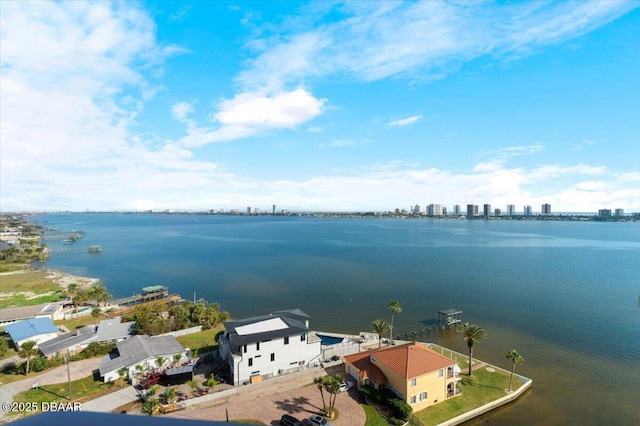 drone / aerial view featuring a water view