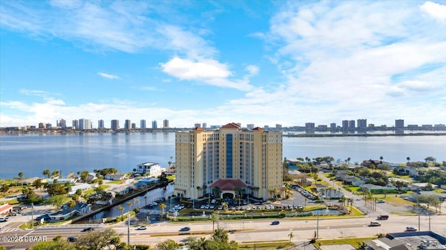 birds eye view of property featuring a water view