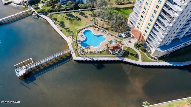 birds eye view of property with a water view