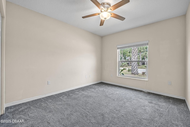 10 Creek Ct, Palm Coast, FL 32137 - carpeted spare room with ceiling fan and baseboards