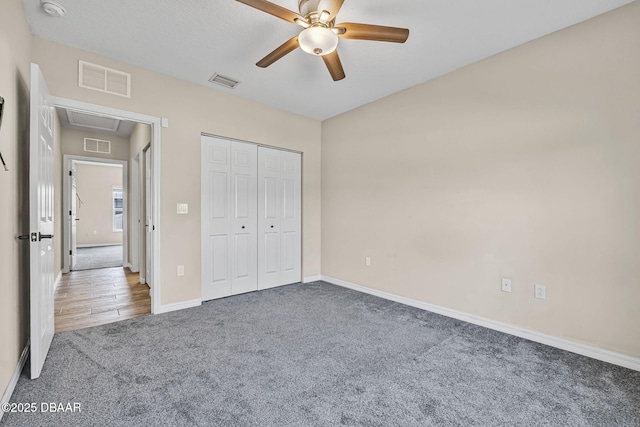 10 Creek Ct, Palm Coast, FL 32137 - unfurnished bedroom with attic access, visible vents, and carpet flooring