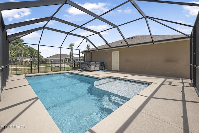 10 Creek Ct, Palm Coast, FL 32137 - view of swimming pool with a patio, a lanai, a fenced in pool, and a hot tub