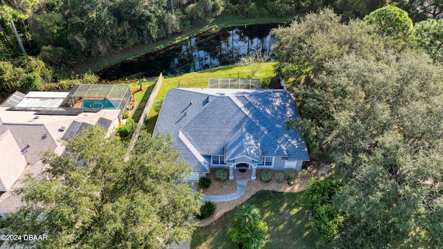 birds eye view of property featuring a water view