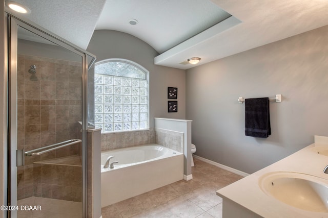 full bathroom featuring vanity, tile patterned floors, separate shower and tub, toilet, and a textured ceiling