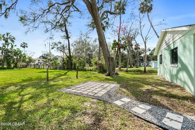 view of yard featuring fence