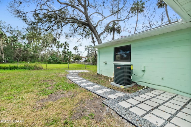 view of yard featuring central AC unit