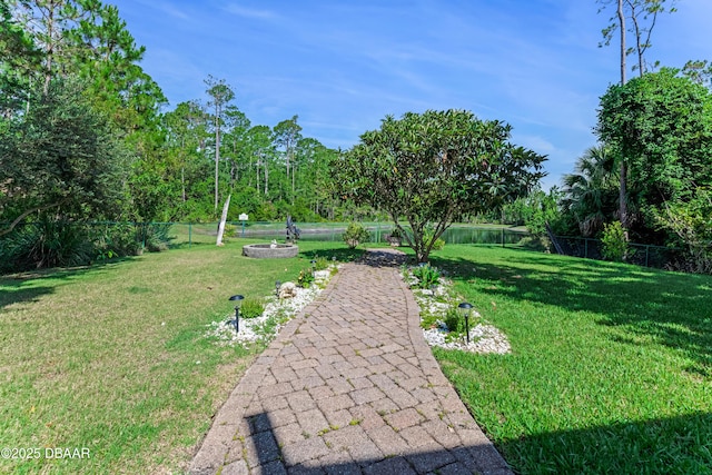 3 Ashford Lakes Dr, Ormond Beach, FL 32174 - view of yard with an outdoor fire pit