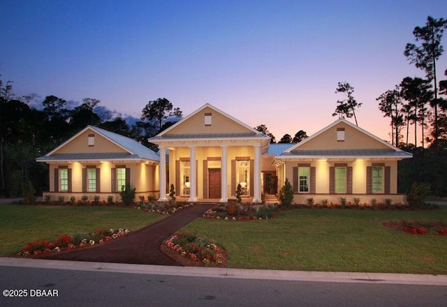 3 Ashford Lakes Dr, Ormond Beach, FL 32174 - neoclassical / greek revival house with covered porch and a front yard