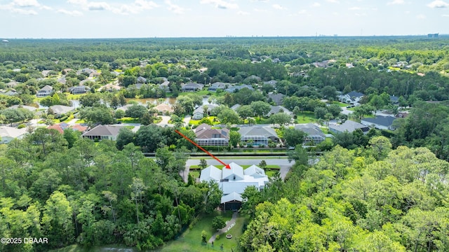 3 Ashford Lakes Dr, Ormond Beach, FL 32174 - aerial view of property's location featuring a forest and nearby suburban area