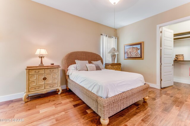 3 Ashford Lakes Dr, Ormond Beach, FL 32174 - bedroom featuring light wood finished floors and baseboards