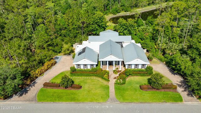 3 Ashford Lakes Dr, Ormond Beach, FL 32174 - view from above of property featuring a heavily wooded area