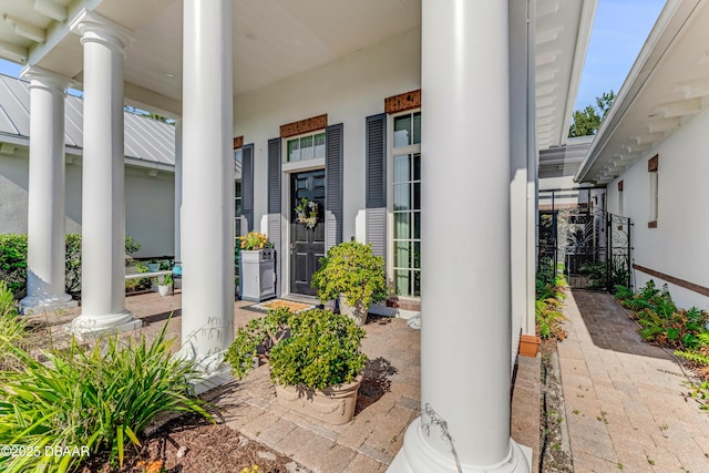 3 Ashford Lakes Dr, Ormond Beach, FL 32174 - property entrance featuring a porch