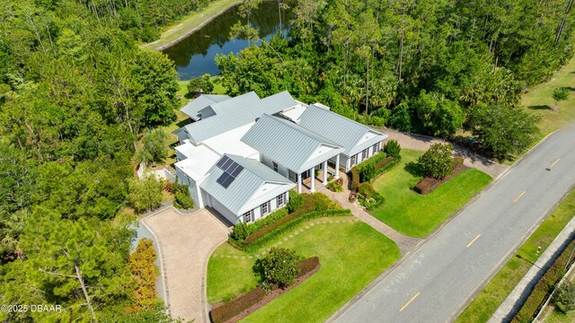 3 Ashford Lakes Dr, Ormond Beach, FL 32174 - aerial view of property and surrounding area featuring a nearby body of water