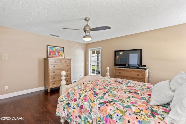 6 Leisure Wood Way, Ormond Beach, FL 32174 - bedroom with a textured ceiling, visible vents, dark wood-style floors, baseboards, and a ceiling fan