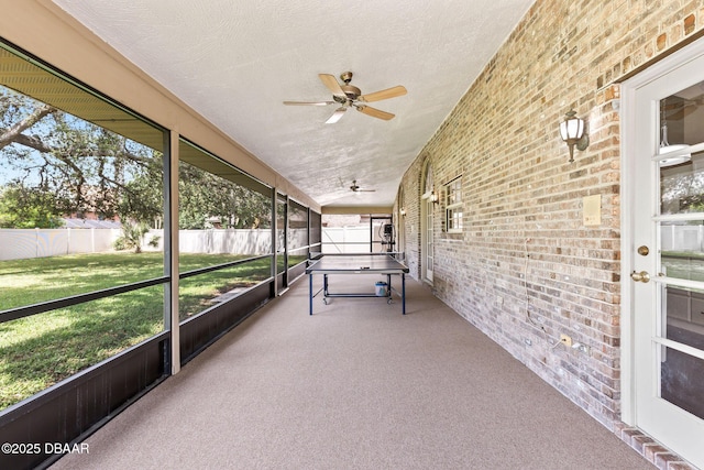 6 Leisure Wood Way, Ormond Beach, FL 32174 - unfurnished sunroom with a ceiling fan