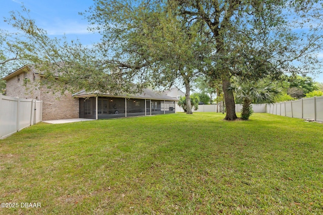 6 Leisure Wood Way, Ormond Beach, FL 32174 - view of yard with a fenced backyard, a sunroom, and a patio area