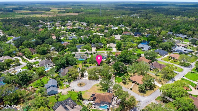 6 Leisure Wood Way, Ormond Beach, FL 32174 - bird's eye view featuring a wooded view and a residential view