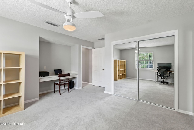 6 Leisure Wood Way, Ormond Beach, FL 32174 - carpeted office space featuring a textured ceiling, visible vents, and a ceiling fan