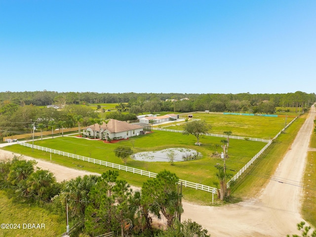 birds eye view of property featuring a rural view