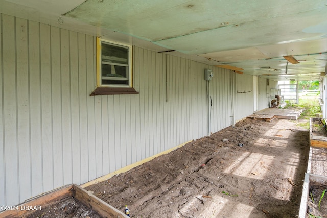 exterior space with a ceiling fan