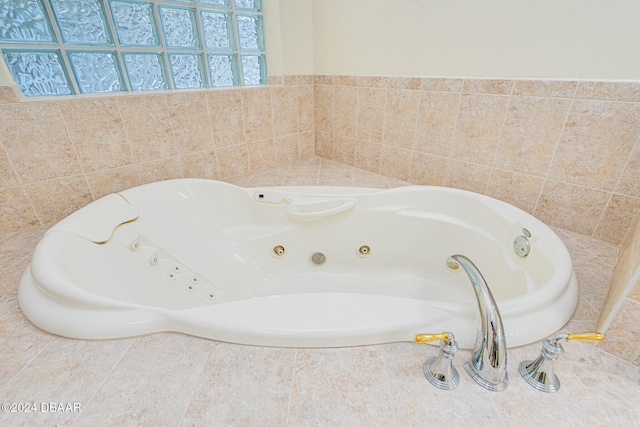 bathroom with a whirlpool tub