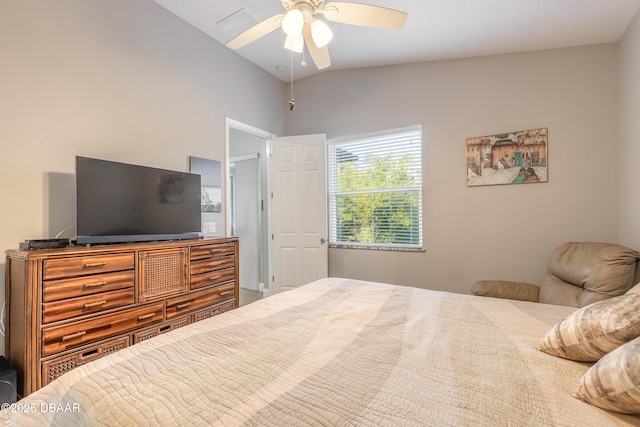 bedroom with ceiling fan and vaulted ceiling