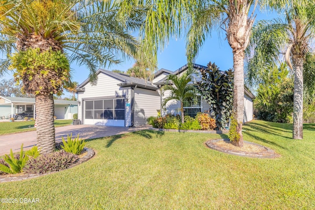 ranch-style home with a front yard and a garage