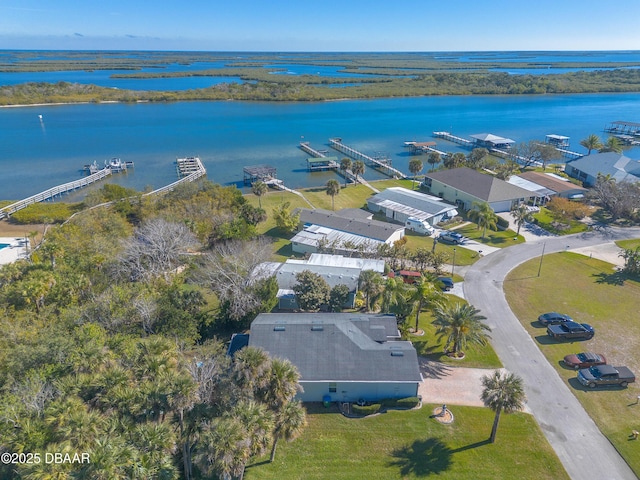 birds eye view of property featuring a water view