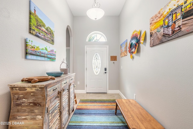 entrance foyer featuring tile patterned floors