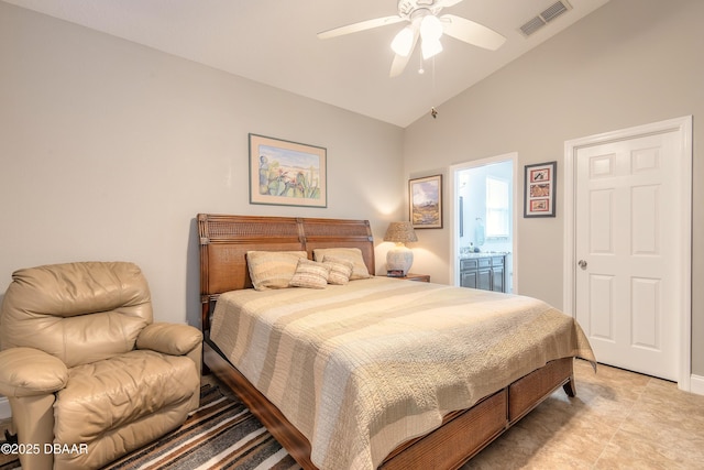 bedroom featuring ensuite bathroom, ceiling fan, and lofted ceiling