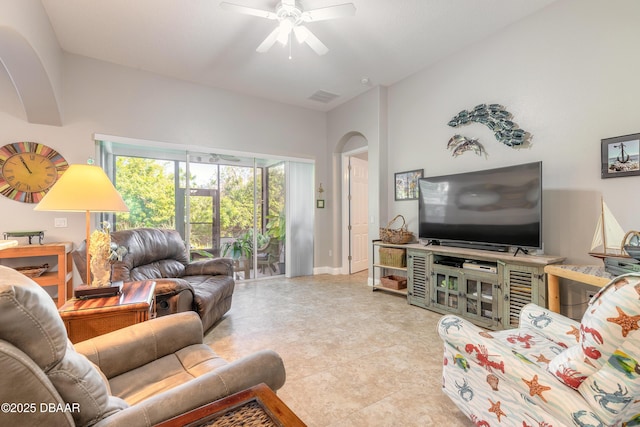 living room featuring ceiling fan and light tile patterned floors