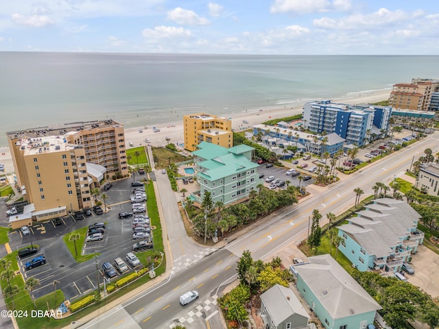 aerial view with a beach view and a water view