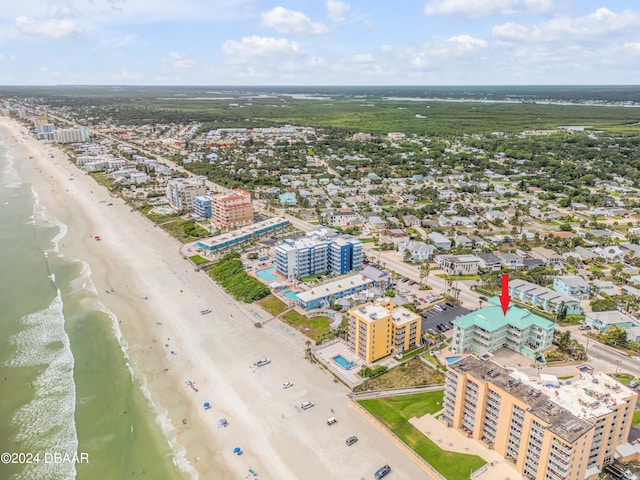 aerial view with a view of the beach and a water view