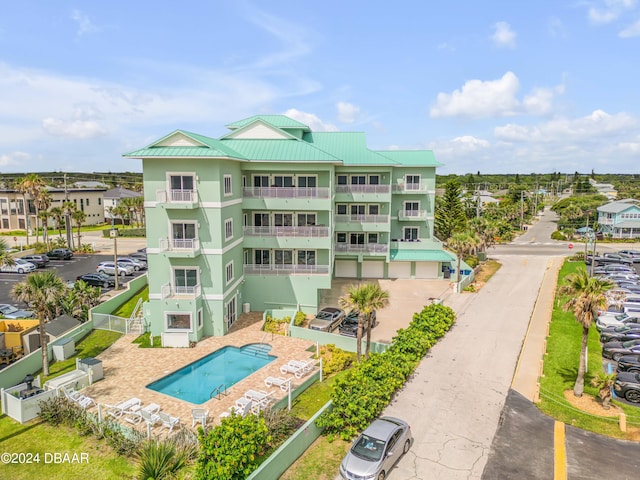 exterior space featuring a community pool