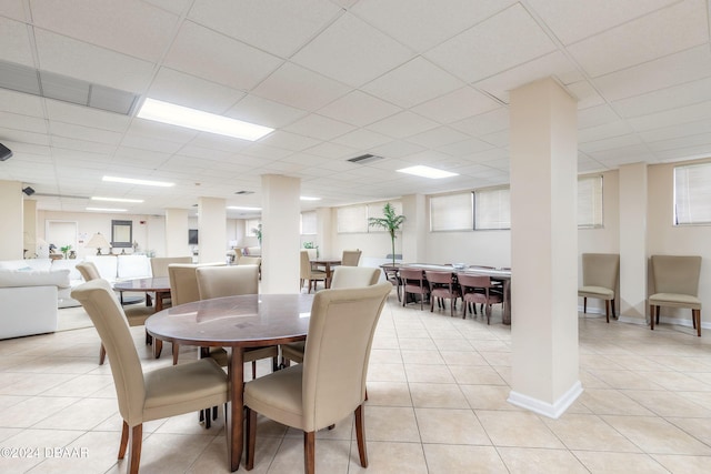 1415 Ocean Shore Blvd Unit 1111, Ormond Beach, FL 32176 - dining space featuring a paneled ceiling and light tile patterned flooring