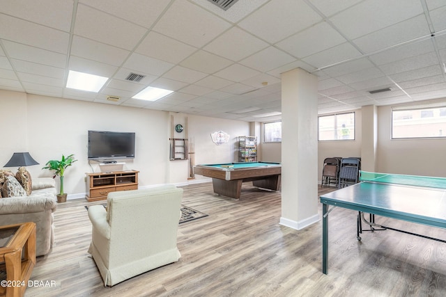 playroom featuring hardwood / wood-style floors, pool table, and a paneled ceiling