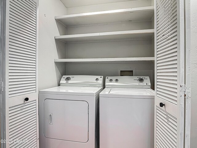 1104 Monticello Ln Unit 4, Port Orange, FL 32129 - laundry room with laundry area and washer and clothes dryer