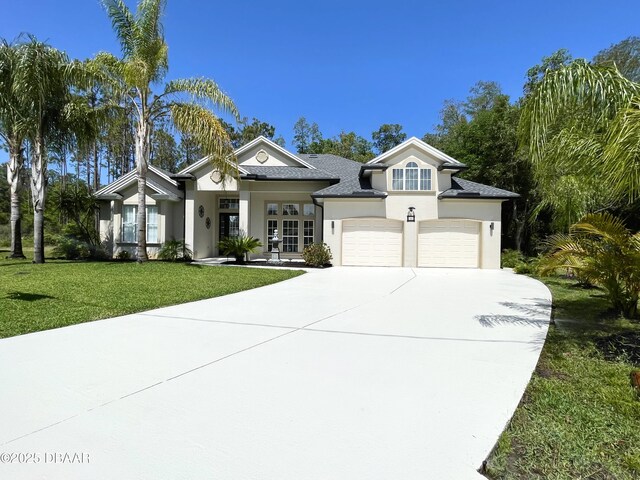 back of house featuring a garage, a lanai, a yard, and ceiling fan