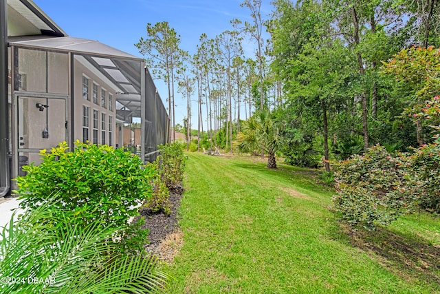 view of yard featuring a lanai