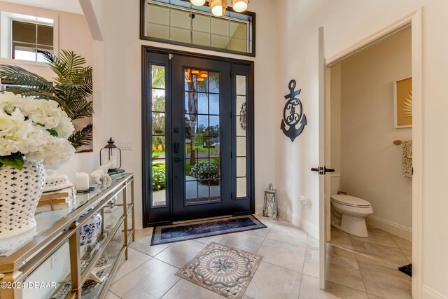 entryway featuring light tile patterned flooring