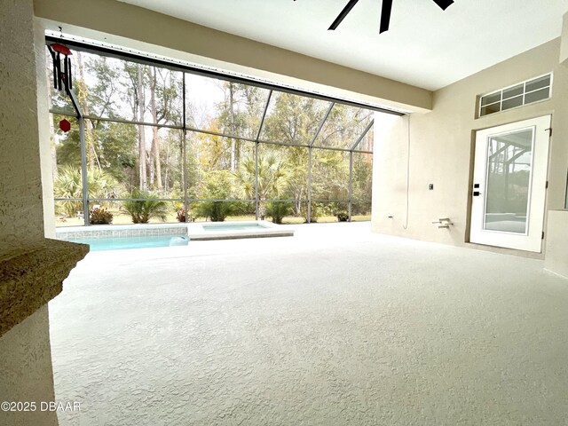 view of swimming pool featuring a patio, a lanai, and pool water feature