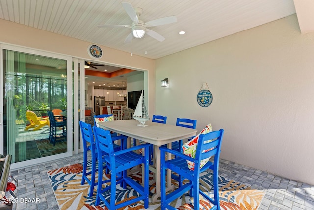 view of patio featuring ceiling fan