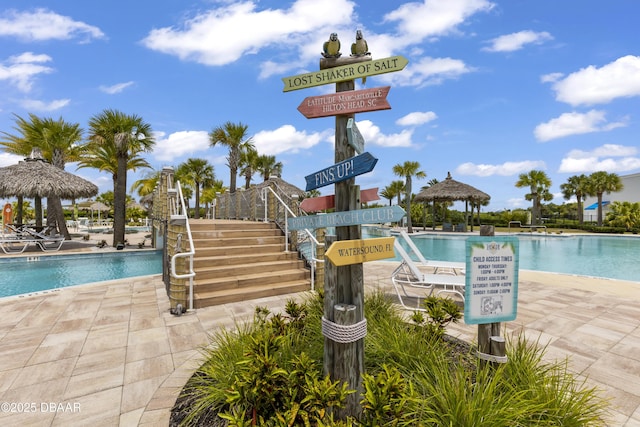 view of pool featuring a gazebo and a patio