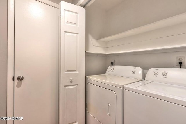 laundry area featuring laundry area and independent washer and dryer