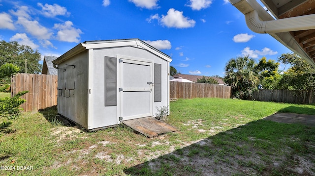 view of outdoor structure with a lawn