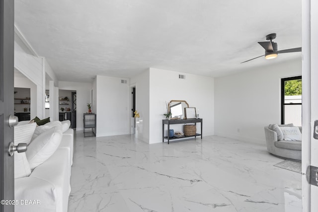 living room featuring ceiling fan