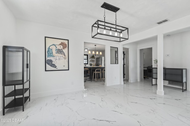 dining room with an inviting chandelier