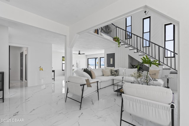 living room with a high ceiling